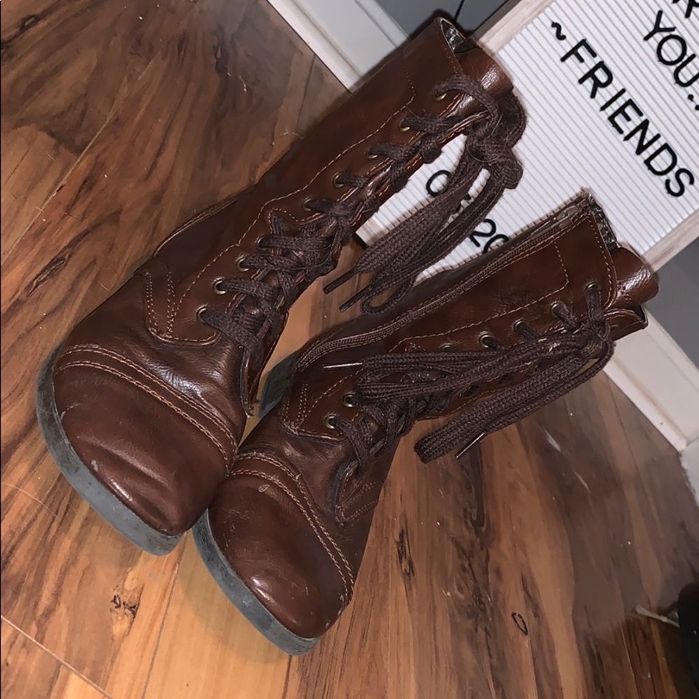 brown zip and tie boots